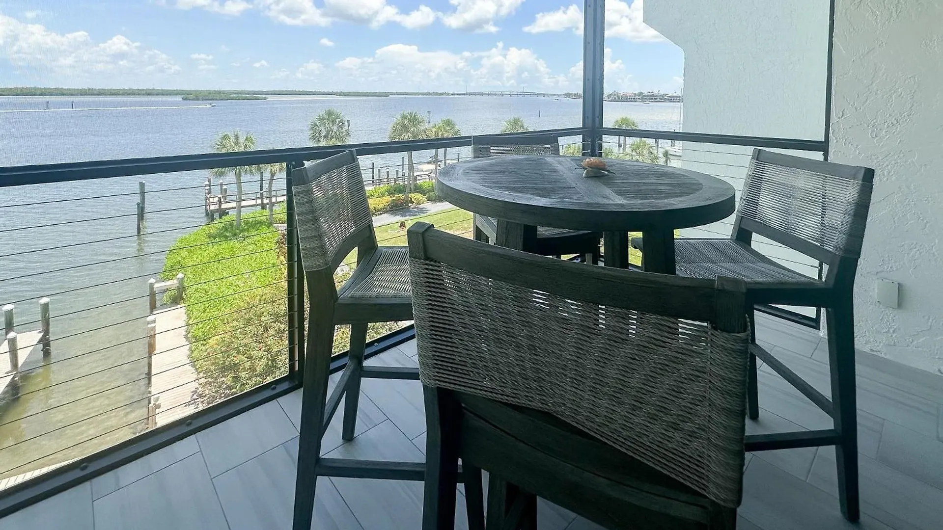 Sunny Days And Blissful Waves In Riverside Apartment